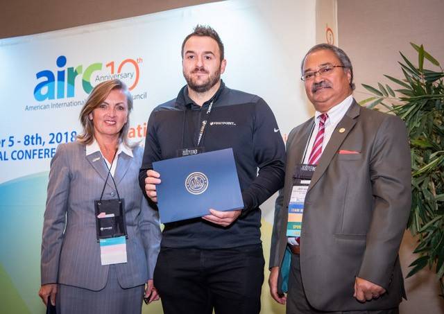 FirstPoint USA's Brendan McGroarty, receiving AIRC Certificate